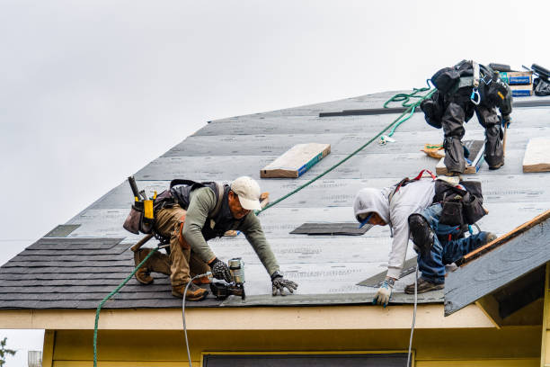 Professional Gutter Installation technician working in Olympia, KY